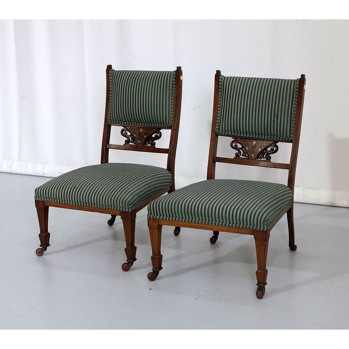 PAIR OF LATE VICTORIAN INLAID MAHOGANY LOW CHAIRS on castors