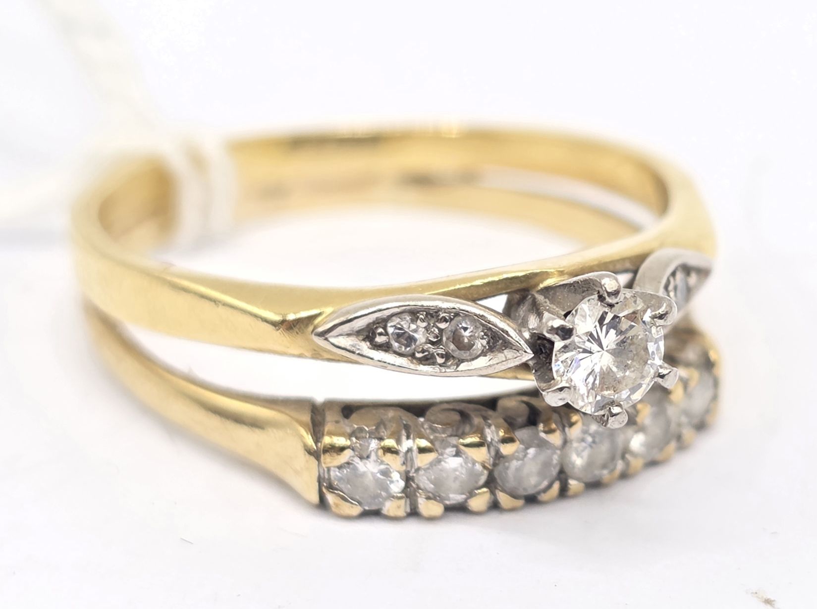 127 · 18CT DIAMOND WEDDING RINGS