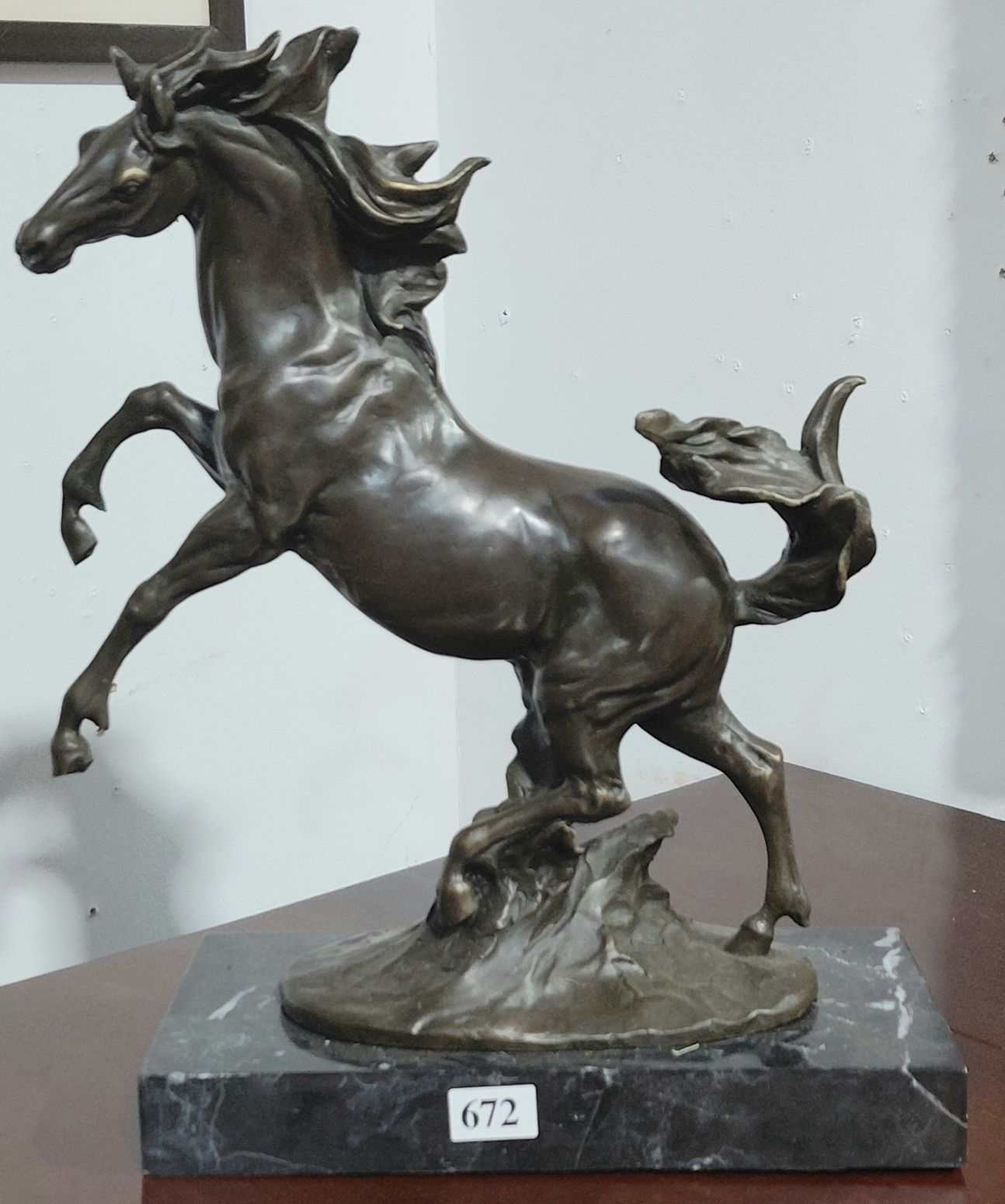 672 · BRONZE FIGURE OF A REARING HORSE