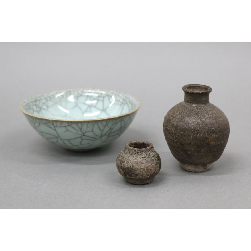 Small Chinese celadon bowl together with two South-East Asian miniature jars