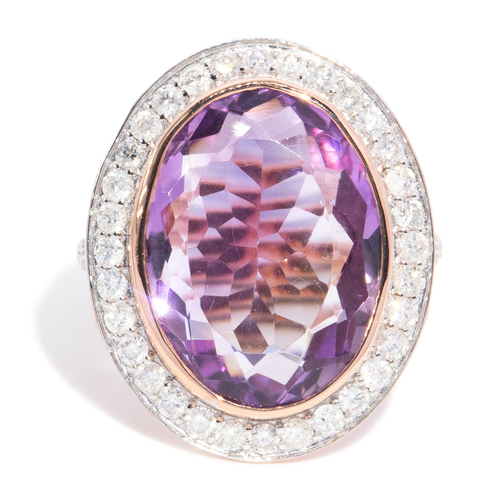 78 · 13.05 Carat Amethyst and 1.00 Carat Diamond Halo 14ct Gold Ring