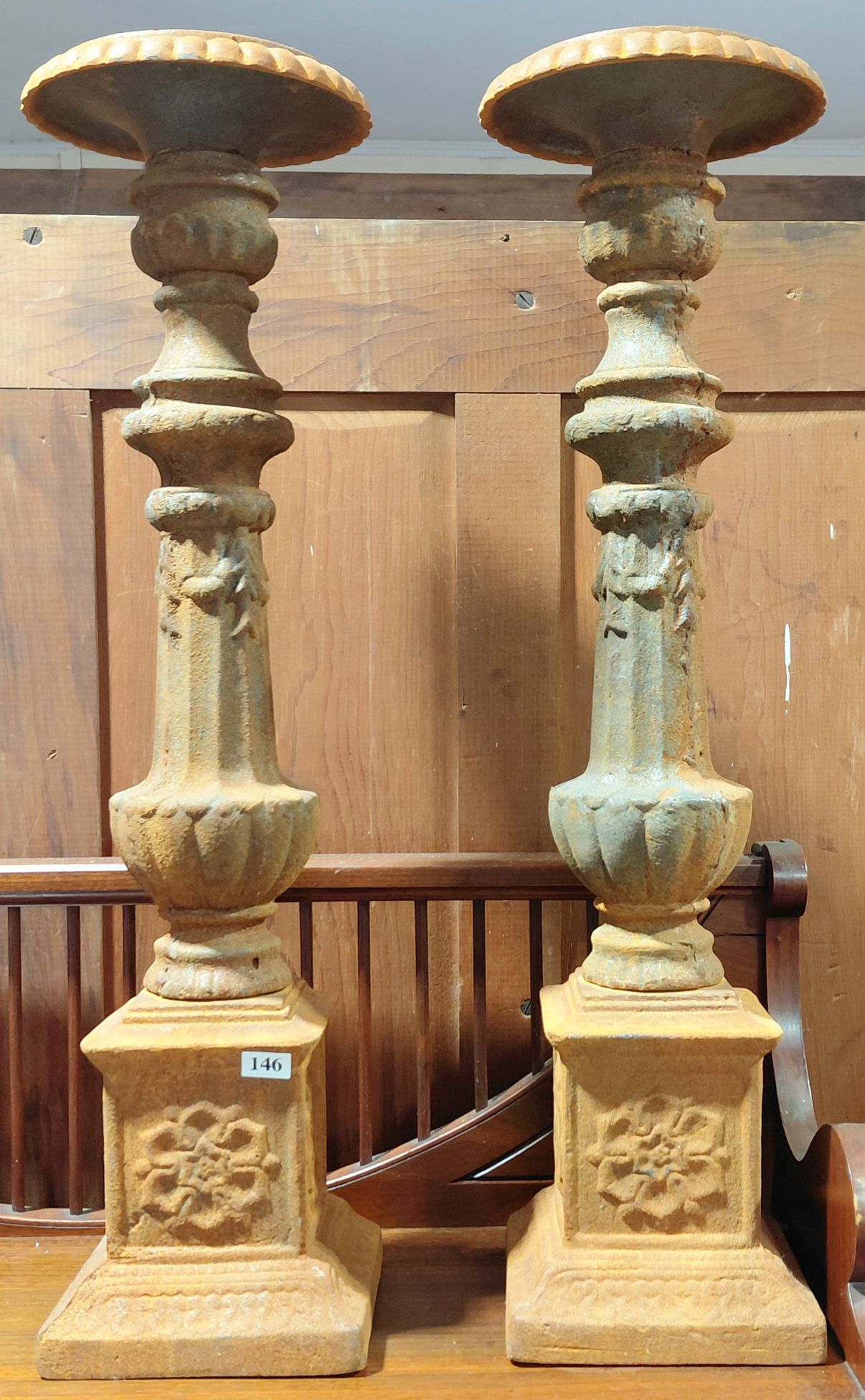146 · CAST IRON CANDLESTICKS