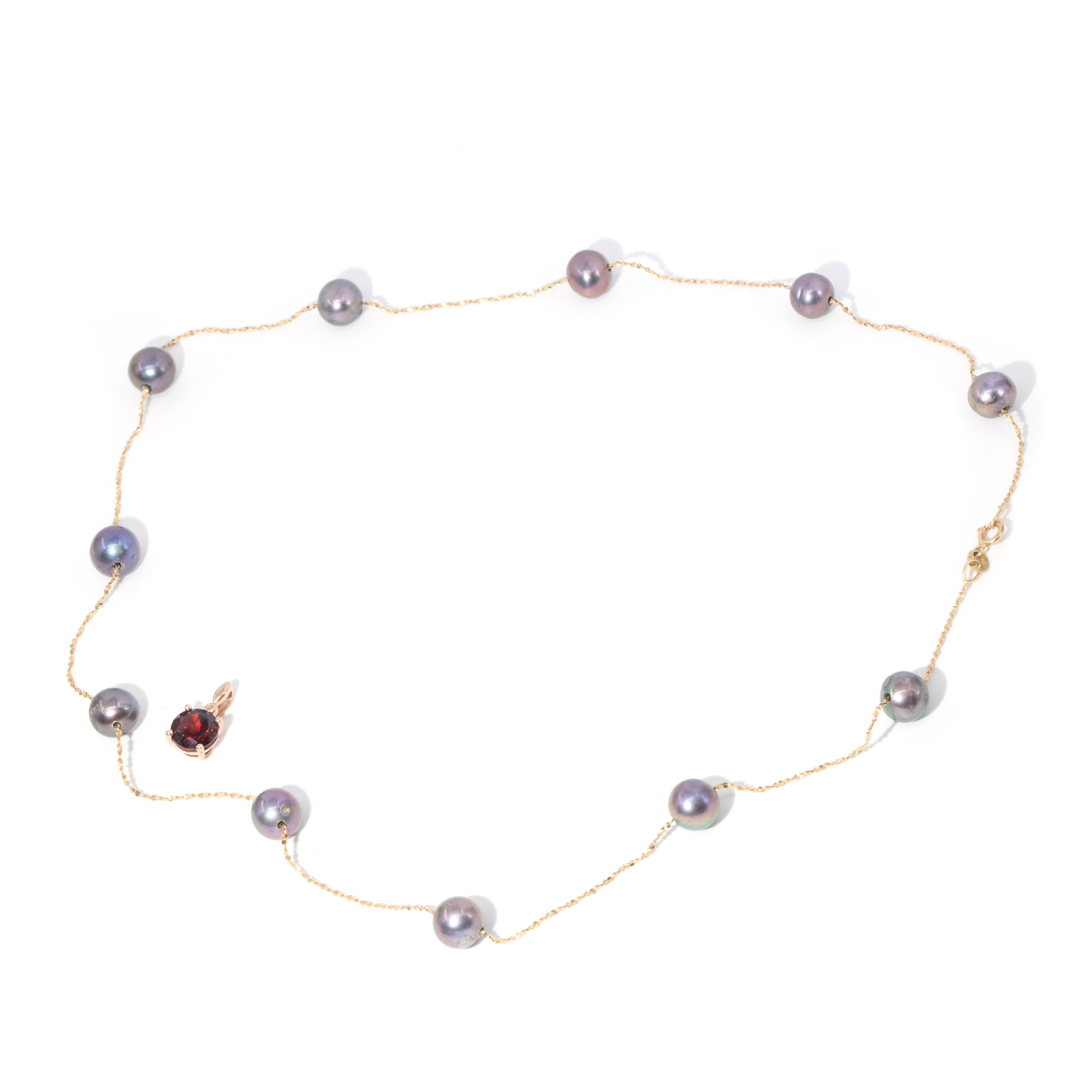 83 · 14ct Gold Pearl Necklace and 9ct Gold Garnet Pendant