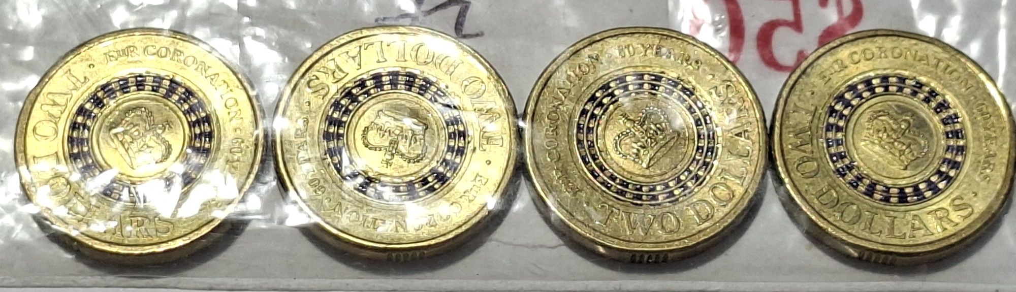 Four Purple Coronation $2 Coins