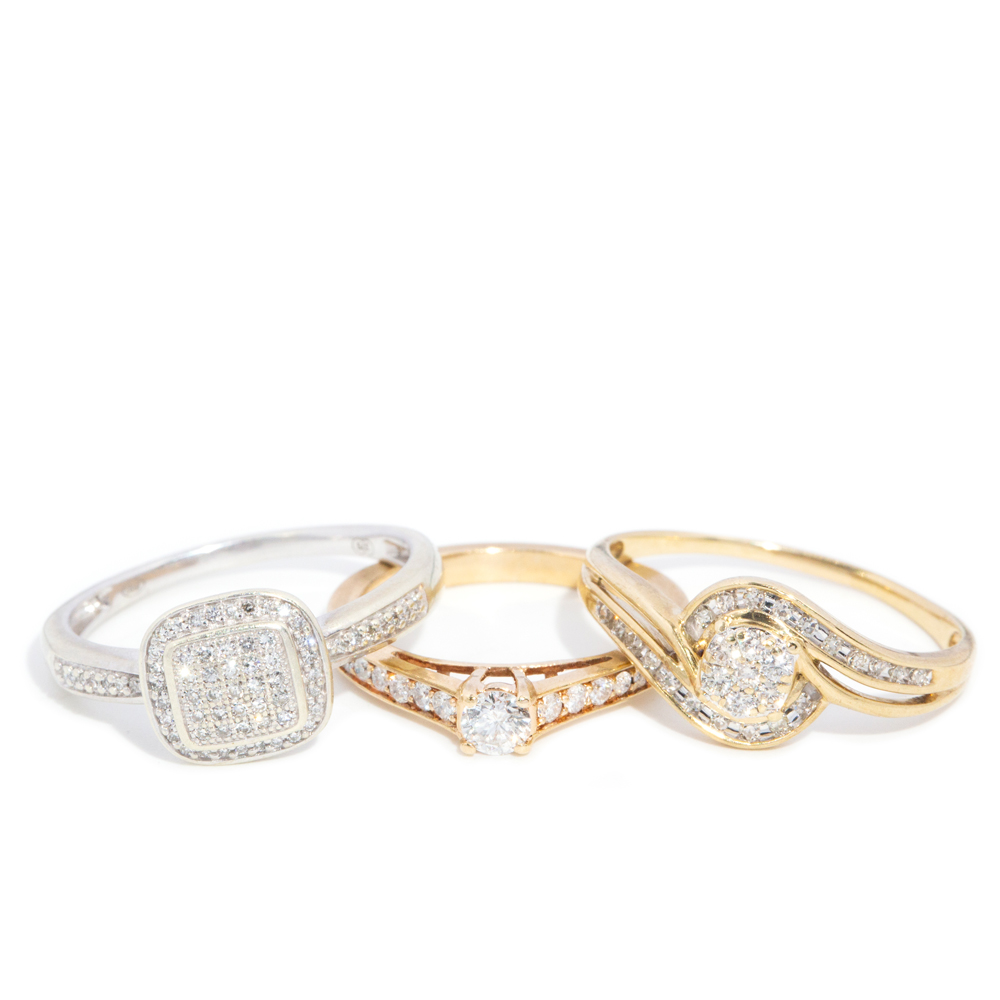 125 · Thee 9ct & 10ct gold diamond rings