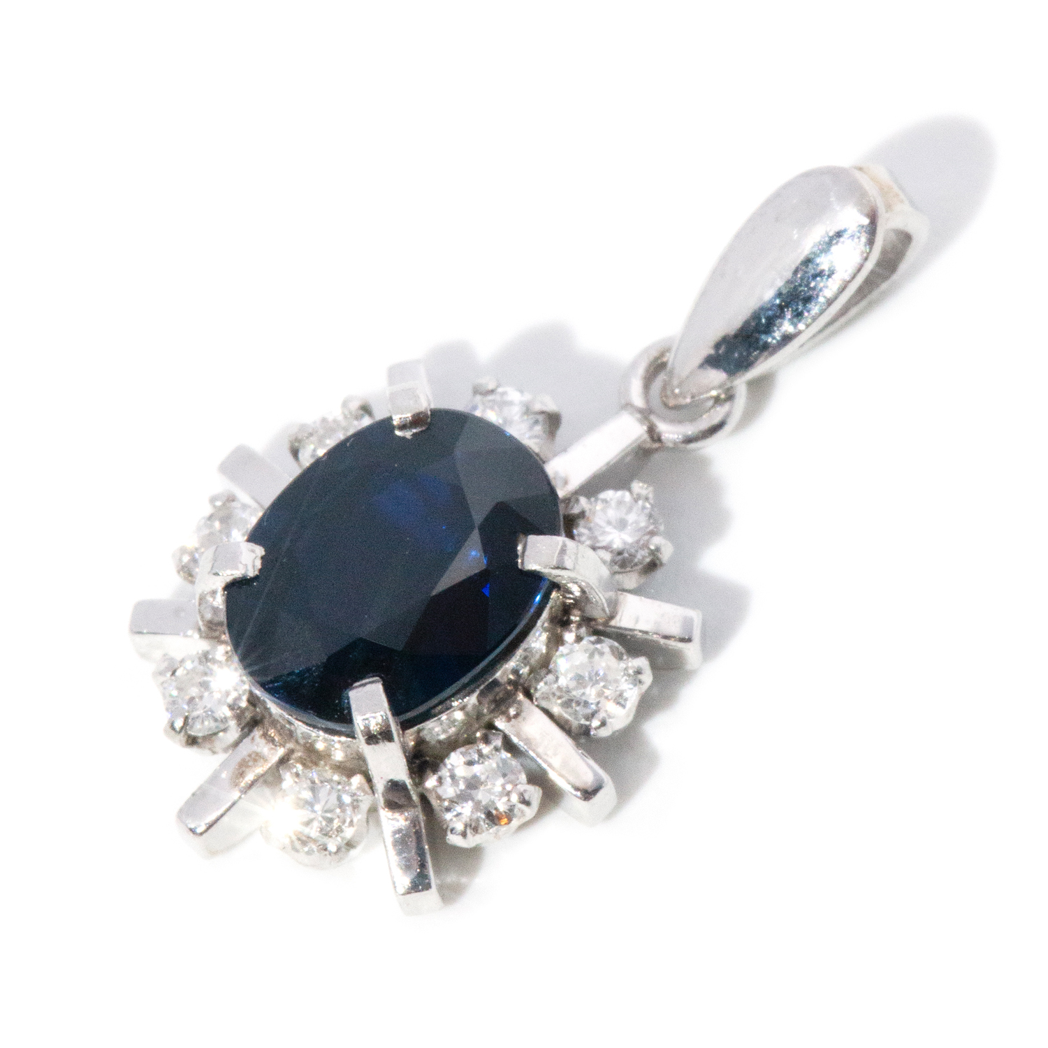 97 · Platinum Sapphire and Diamond Pendant