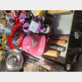 Girls roller blades, bike helmets, baseball bats and tennis rackets