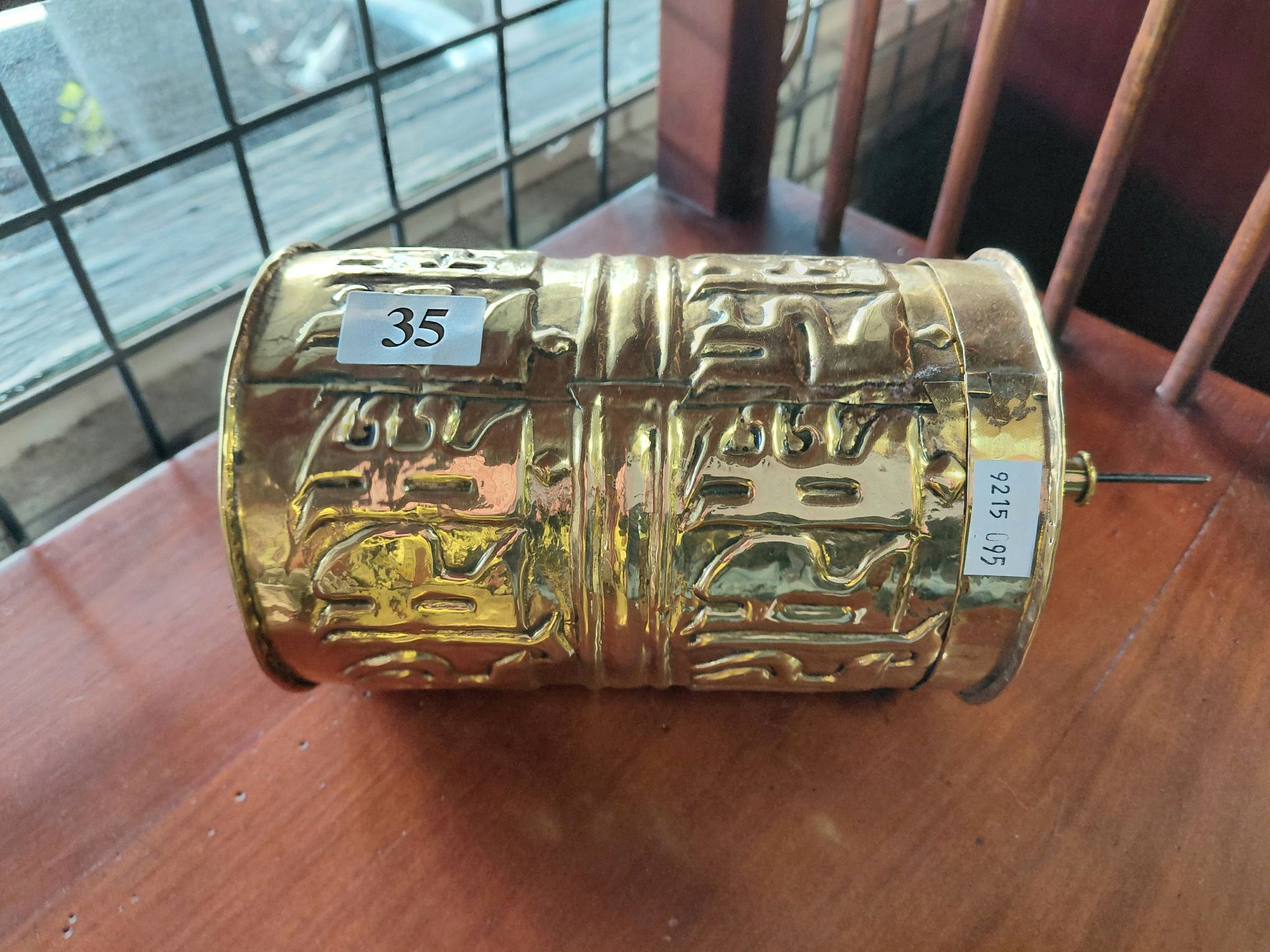 35 · TIBETAN PRAYER WHEEL
