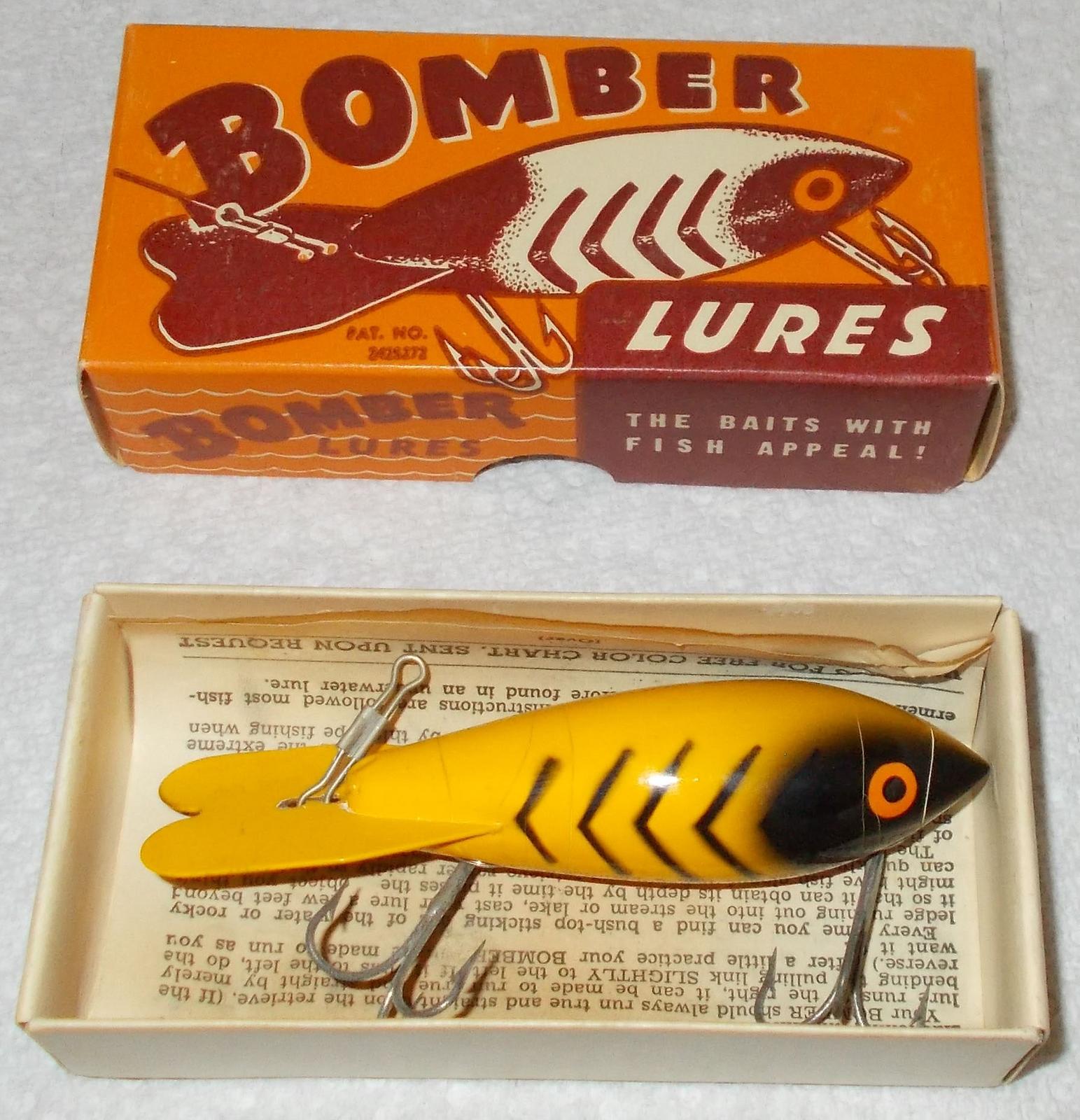 Sold at Auction: Vintage Wood Bomber Orange Black Ribs Fishing Lure