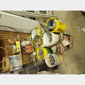 Multiple buckets of bolts and salvage metals, and on shelf