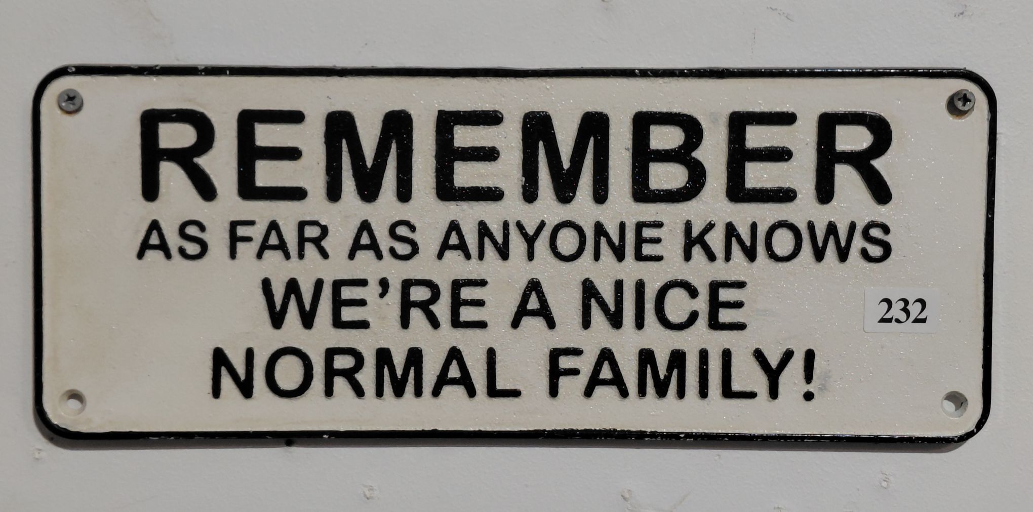 232 · NOVELTY SIGN