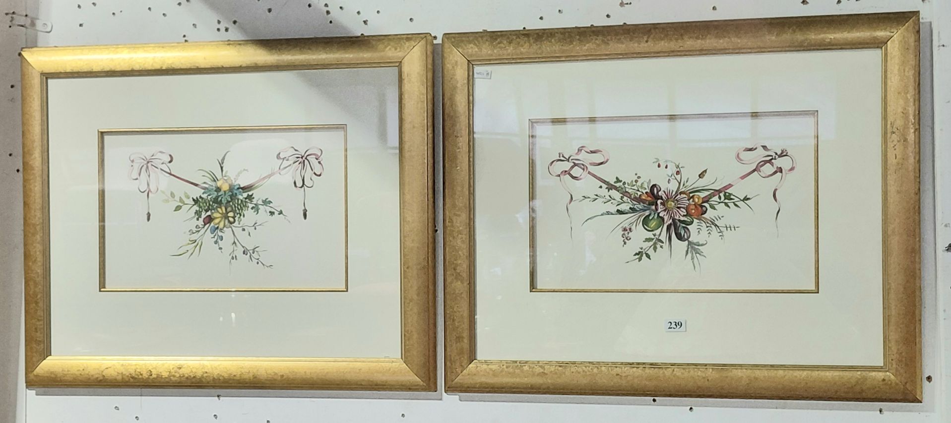 239 · A PAIR OF HAND COLOURED PRINTS