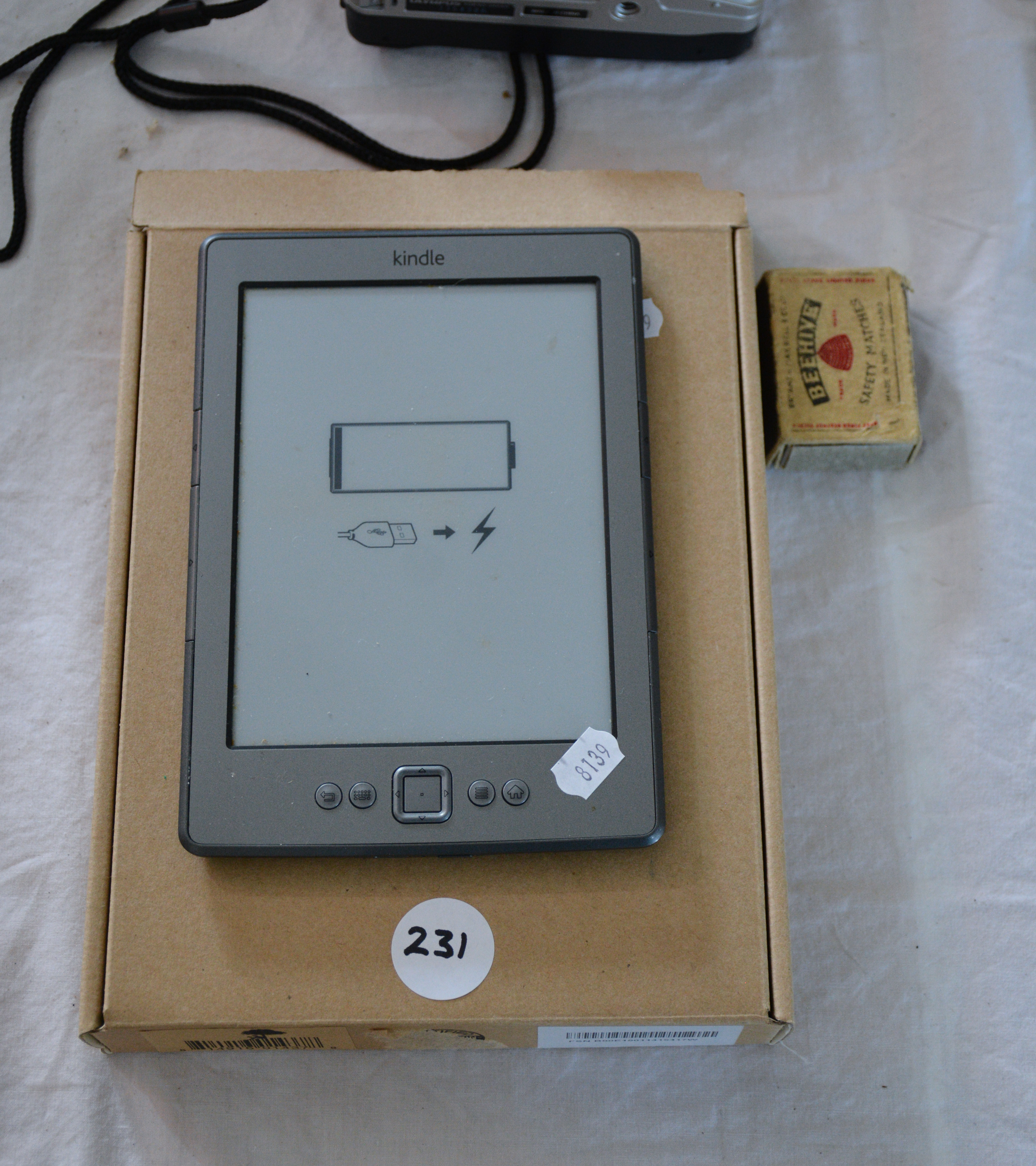 Kindle Model D01100 — sold at auction in New Zealand for $15