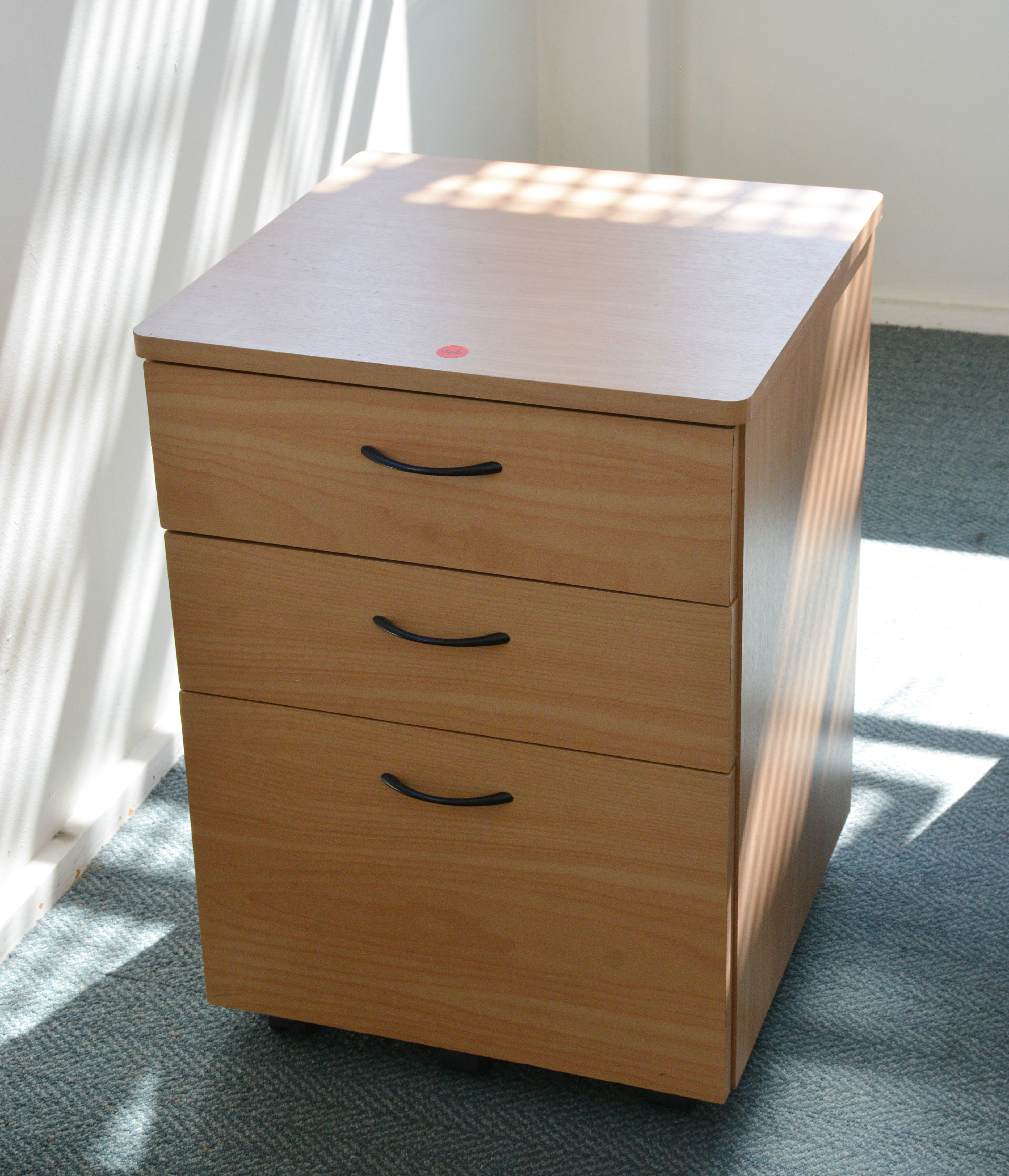 Wood Three Drawer Office Unit — sold at auction in New Zealand for $35
