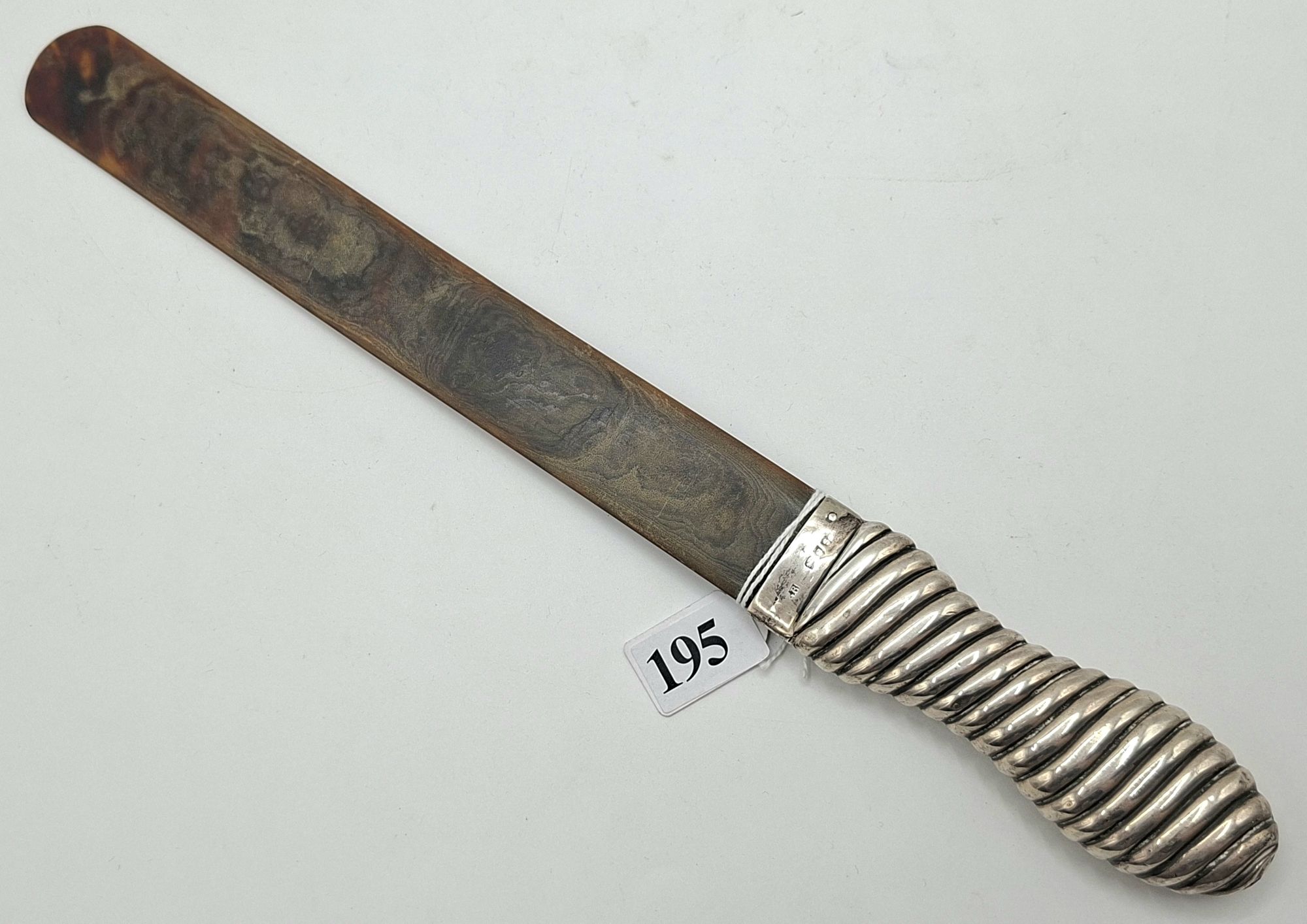 195 · STERLING SILVER AND TORTOISE SHELL PAGE TURNER