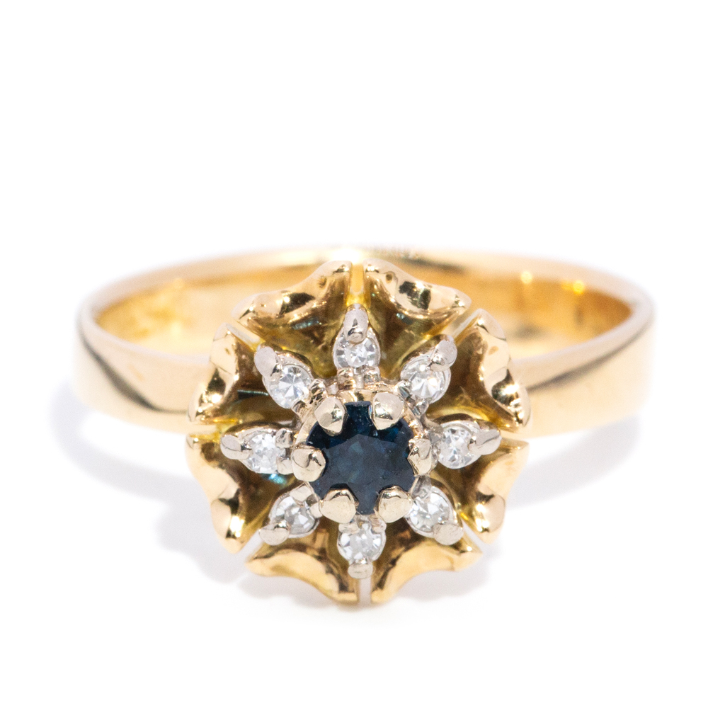 57 · Sapphire and Diamond Cluster Ring