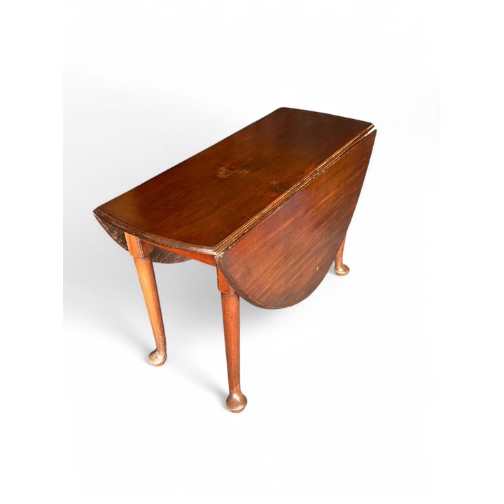 A small George II mahogany drop flap dining table