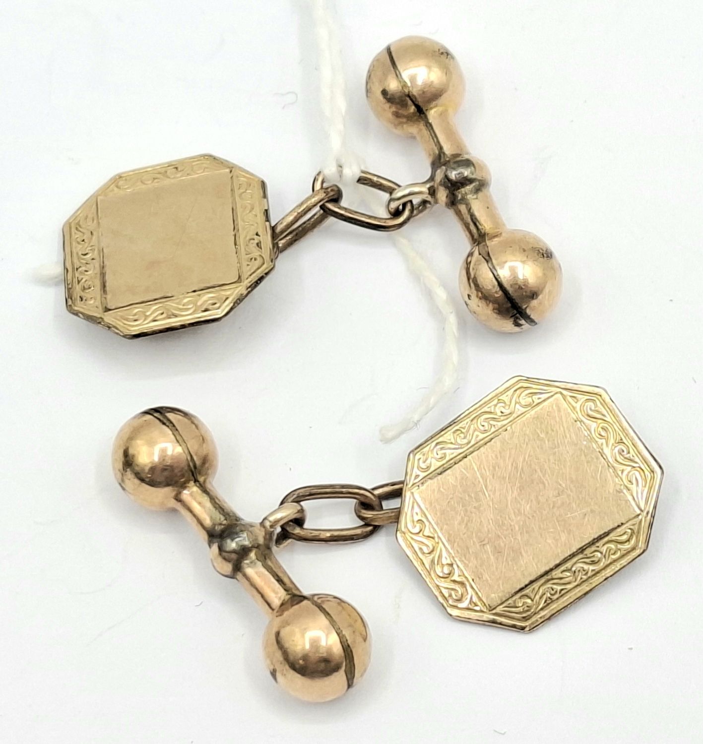 A Pair Of Gold Plated Cufflinks