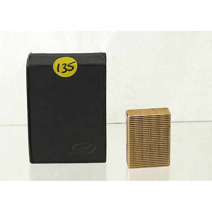 A CASED DU PONT GOLDPLATED CIGARETTE LIGHTER.