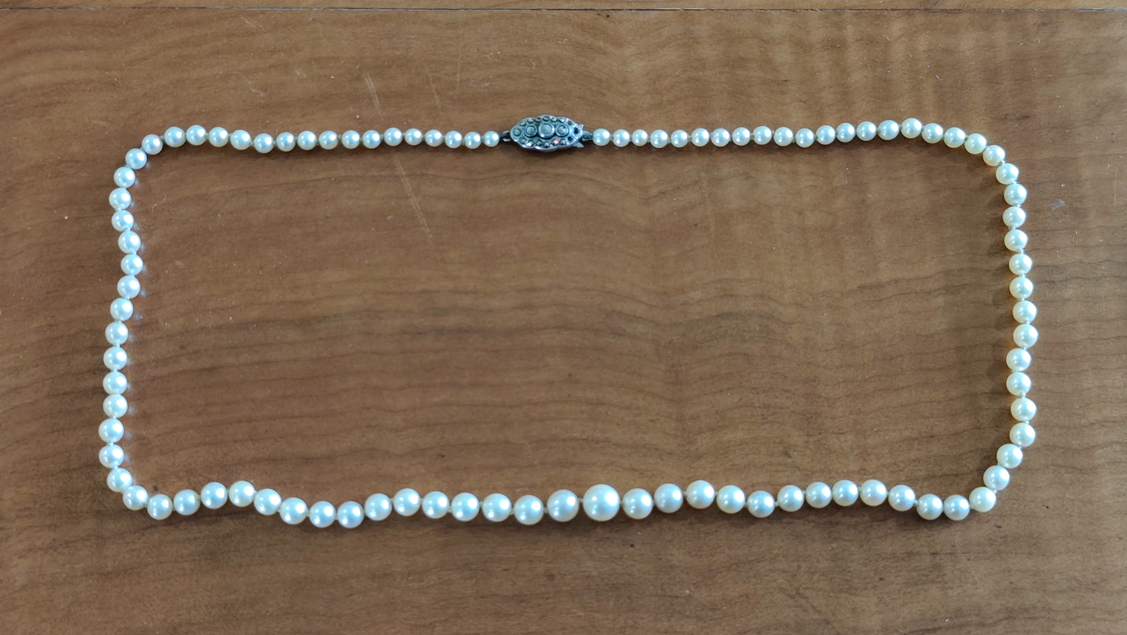 Single Strand Knotted Pearl Necklace, Silver Clasp — sold at auction in New Zealand for $180