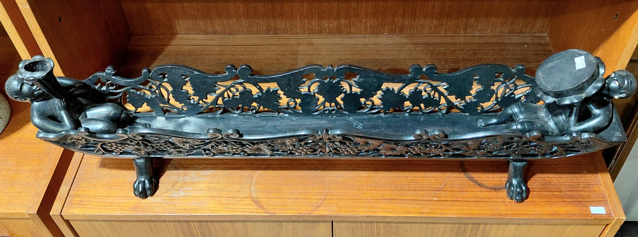 254 · EBONISED WOOD CENTRE PIECE