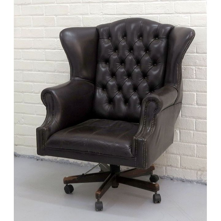 LARGE LEATHER BUTTON UPHOLSTERED SWIVEL CHAIR