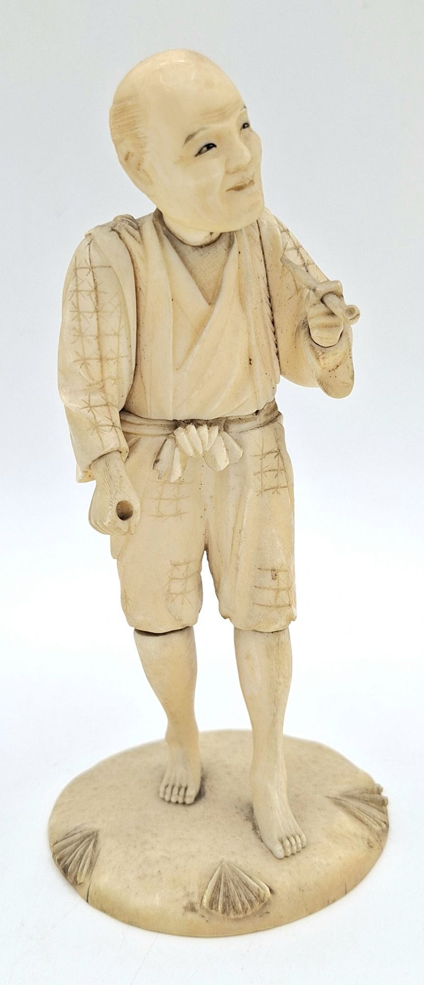 26 · ANTIQUE JAPANESE IVORY FIGURE