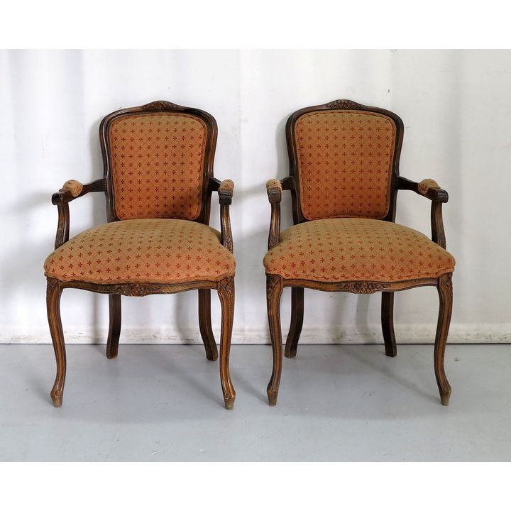 PAIR OF UPHOLSTERED OAK OPEN ARMCHAIRS