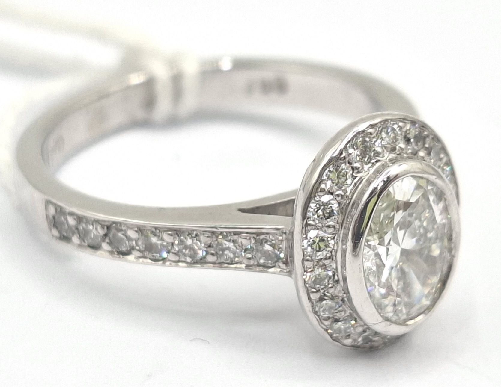 280 · 18CT WHITE GOLD DIAMOND HALO RING