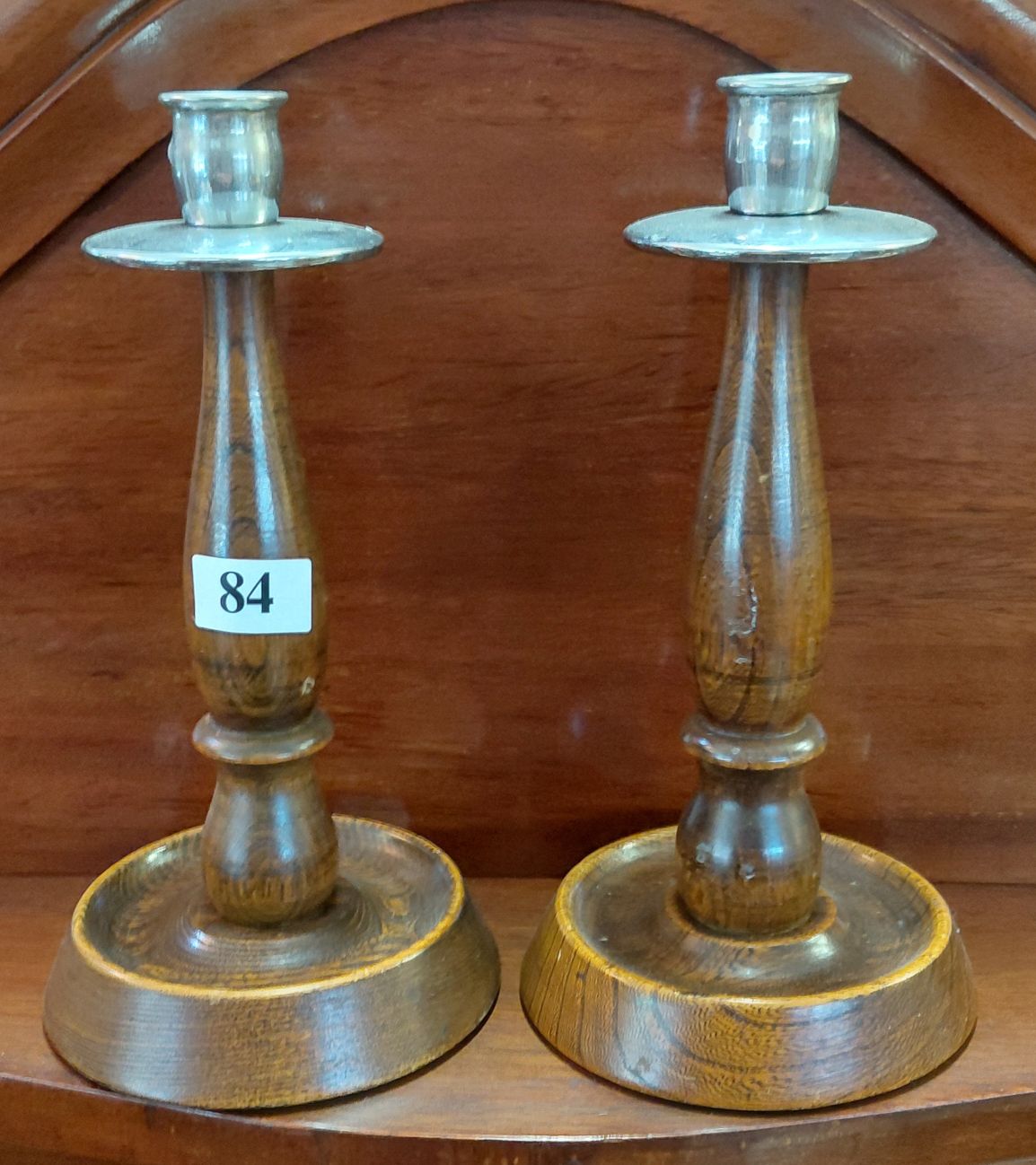 A Pair Of Oak Candlesticks