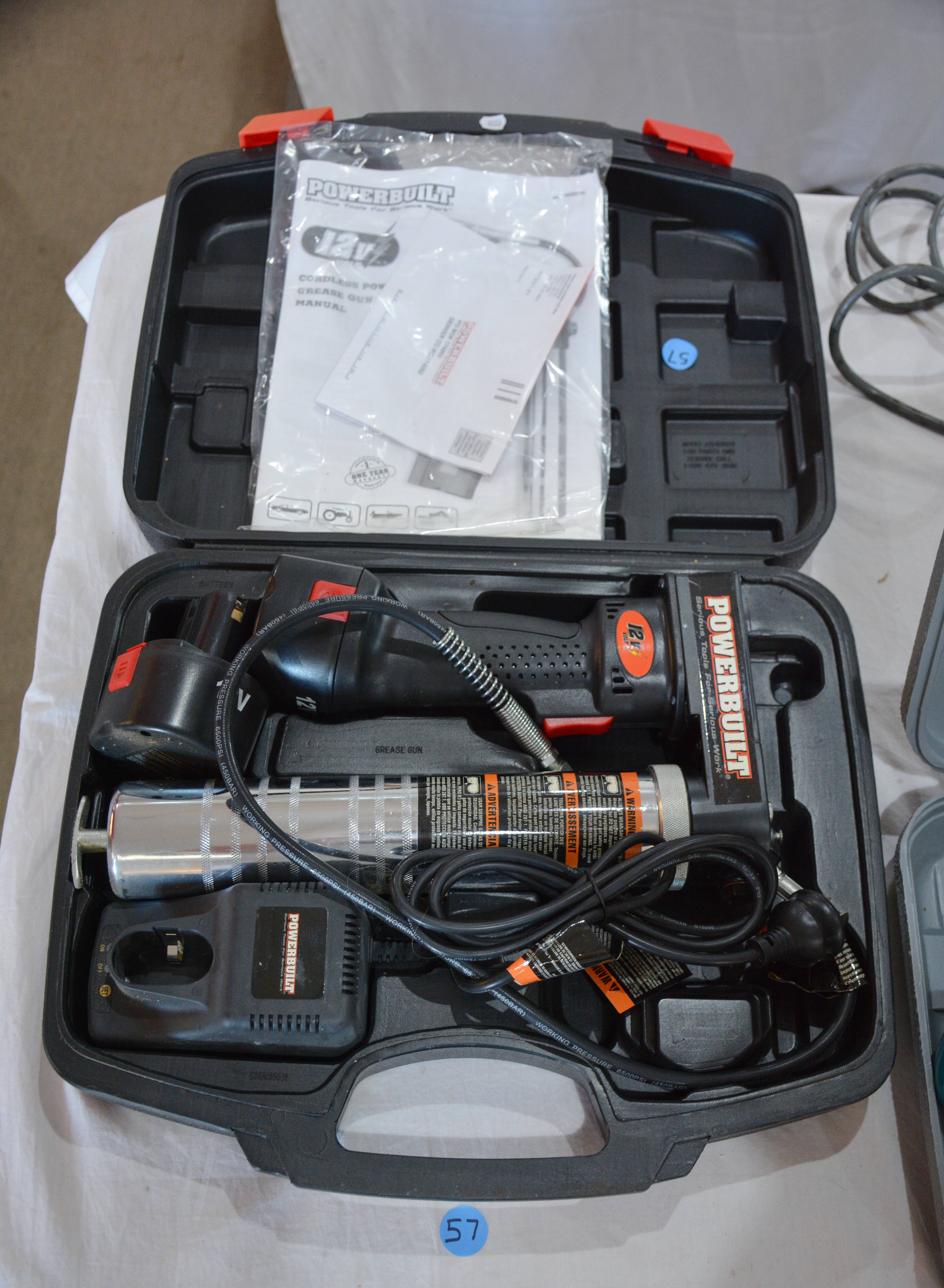 Powerbuilt 12V Cordless Power Grease Gun — NZ auction result