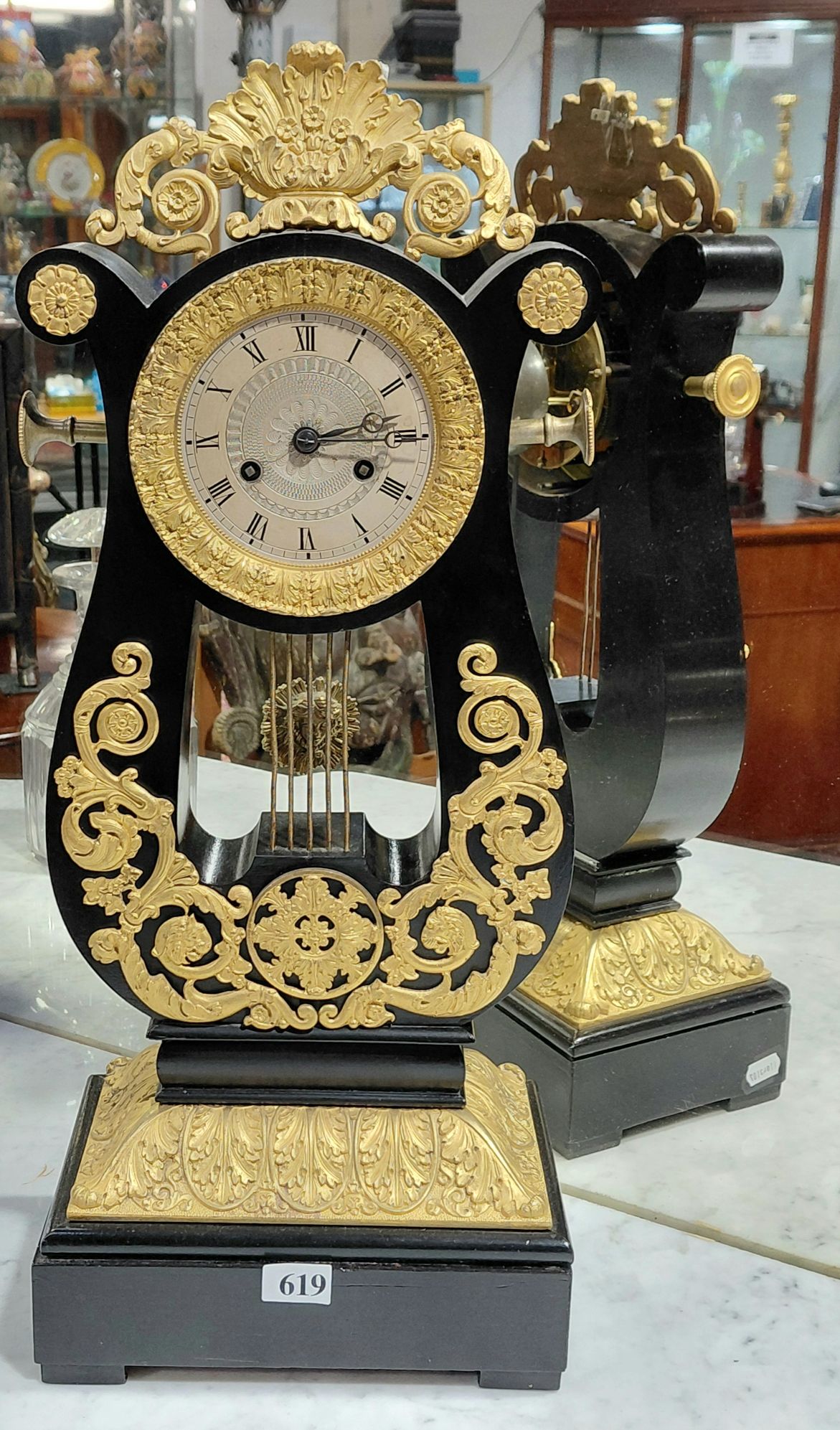 A FRENCH EMPIRE LYRE CLOCK