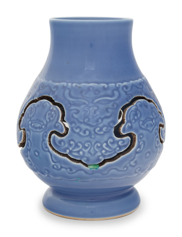 A Claire-de-Lune Glazed Carved Porcelain Reticulated Vase
Height 9 1/4 in., 23.5 cm.