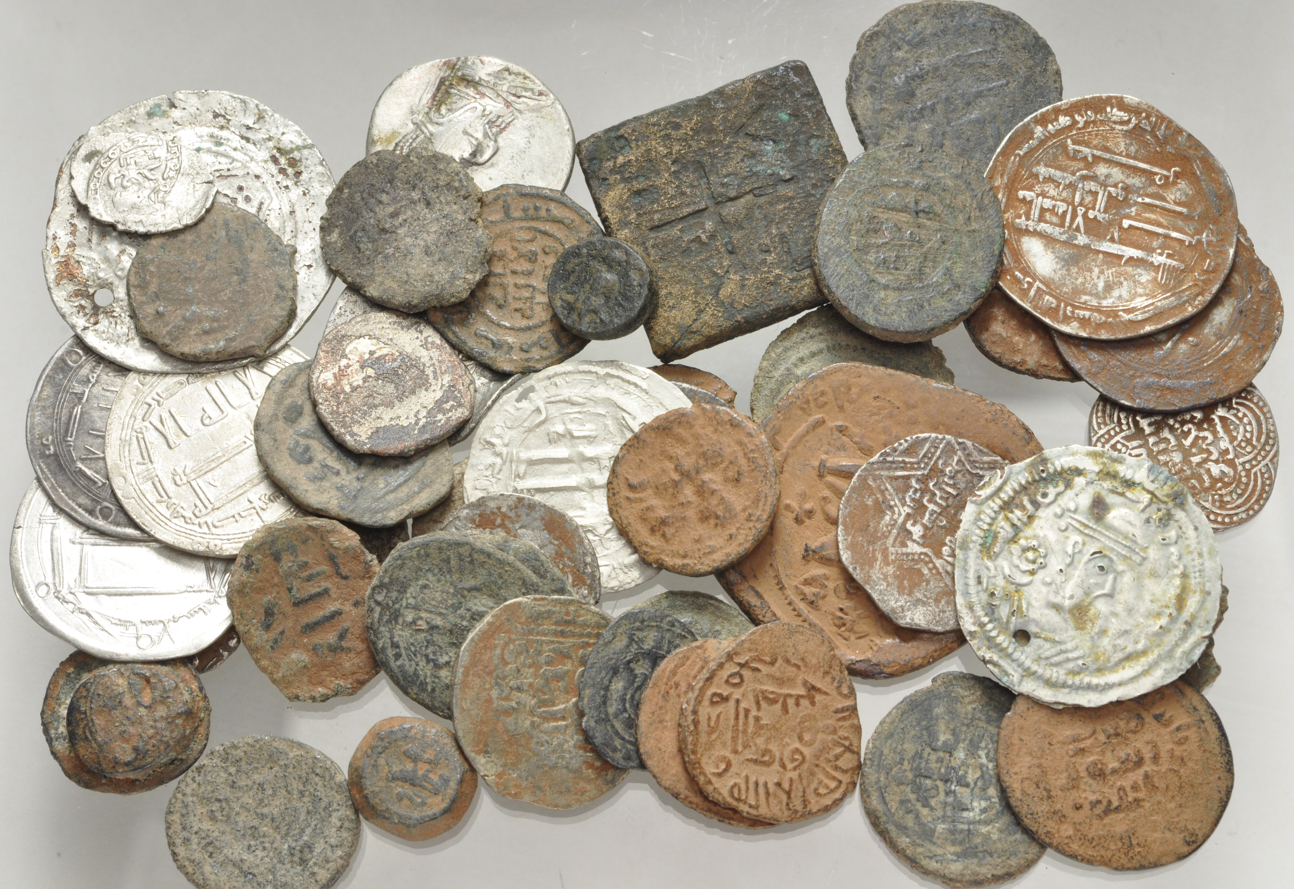 MIXED. Oriental Greek-Islamic. Lot of forty-nine (49) silver and bronze ...