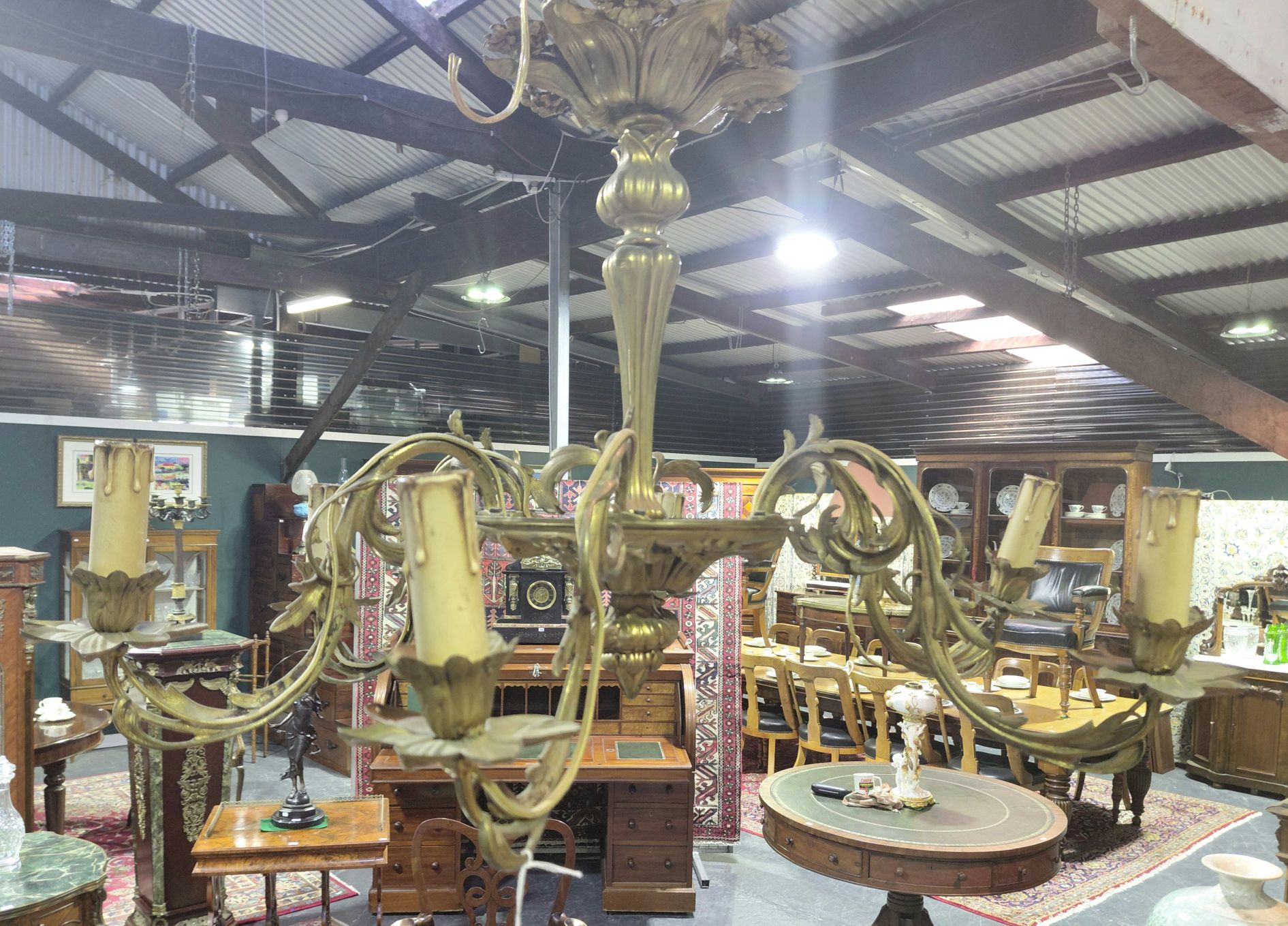 634 · ART NOUVEAU PRESSED BRASS CHANDELIER