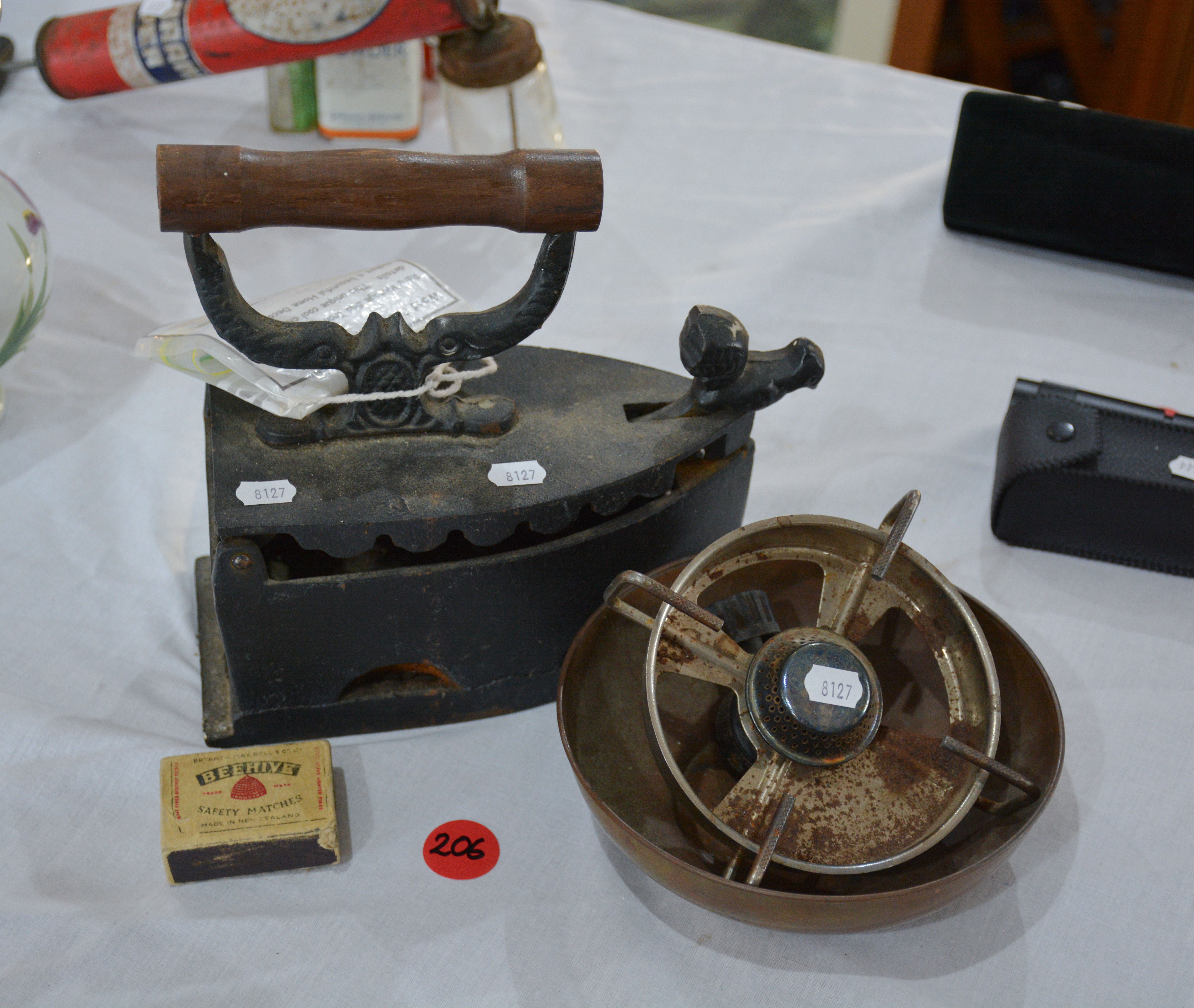 Wood Cast Clothes Iron, Burner and Bowl — sold at auction in New Zealand for $10