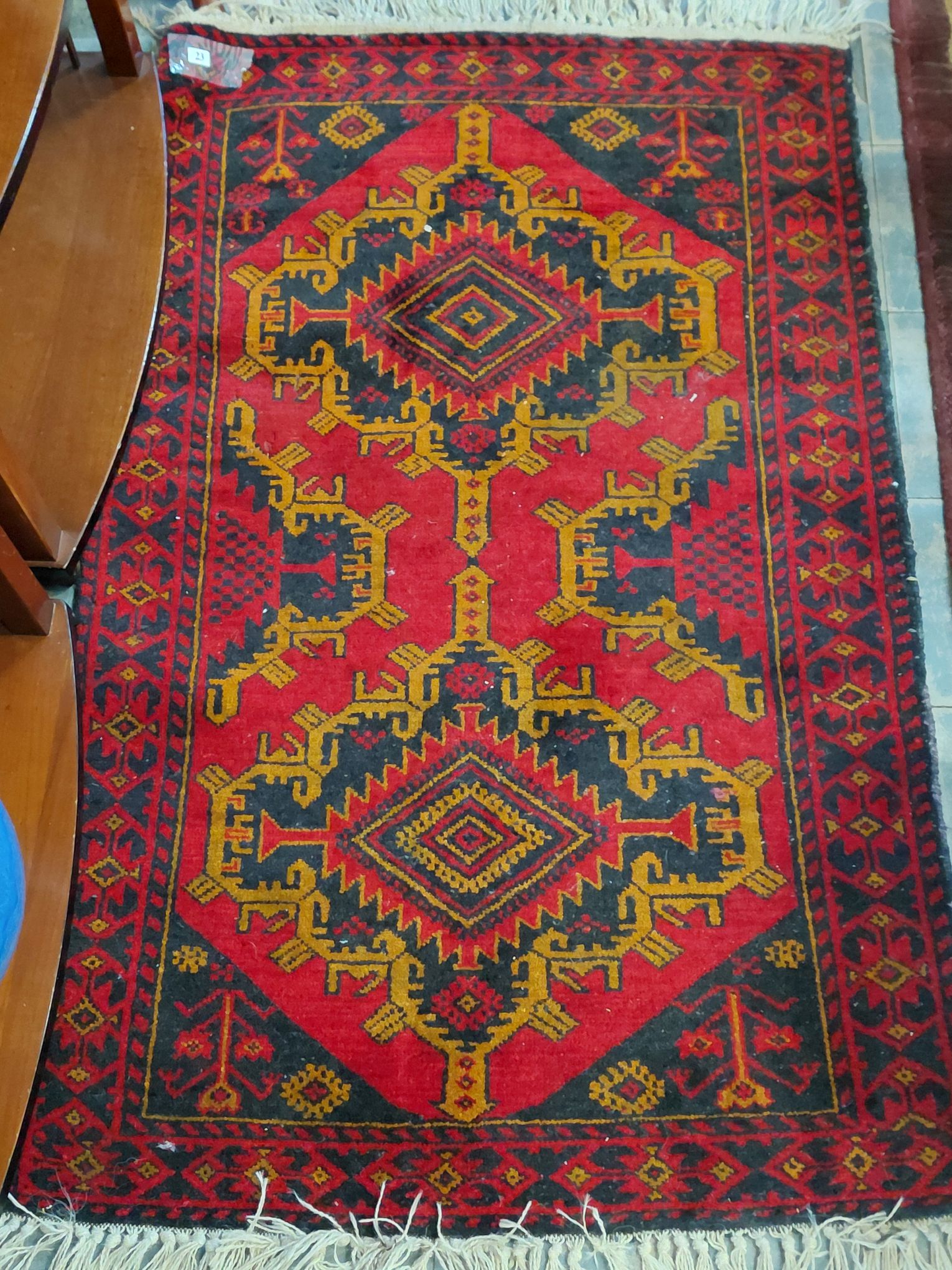 23 · PERSIAN BALOUCH RUG