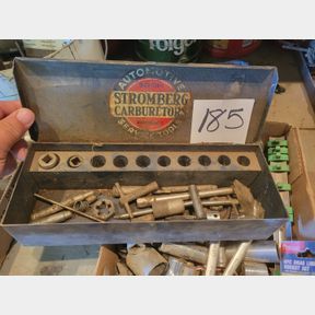 Antique Stromberg automotive box with a few goodies
