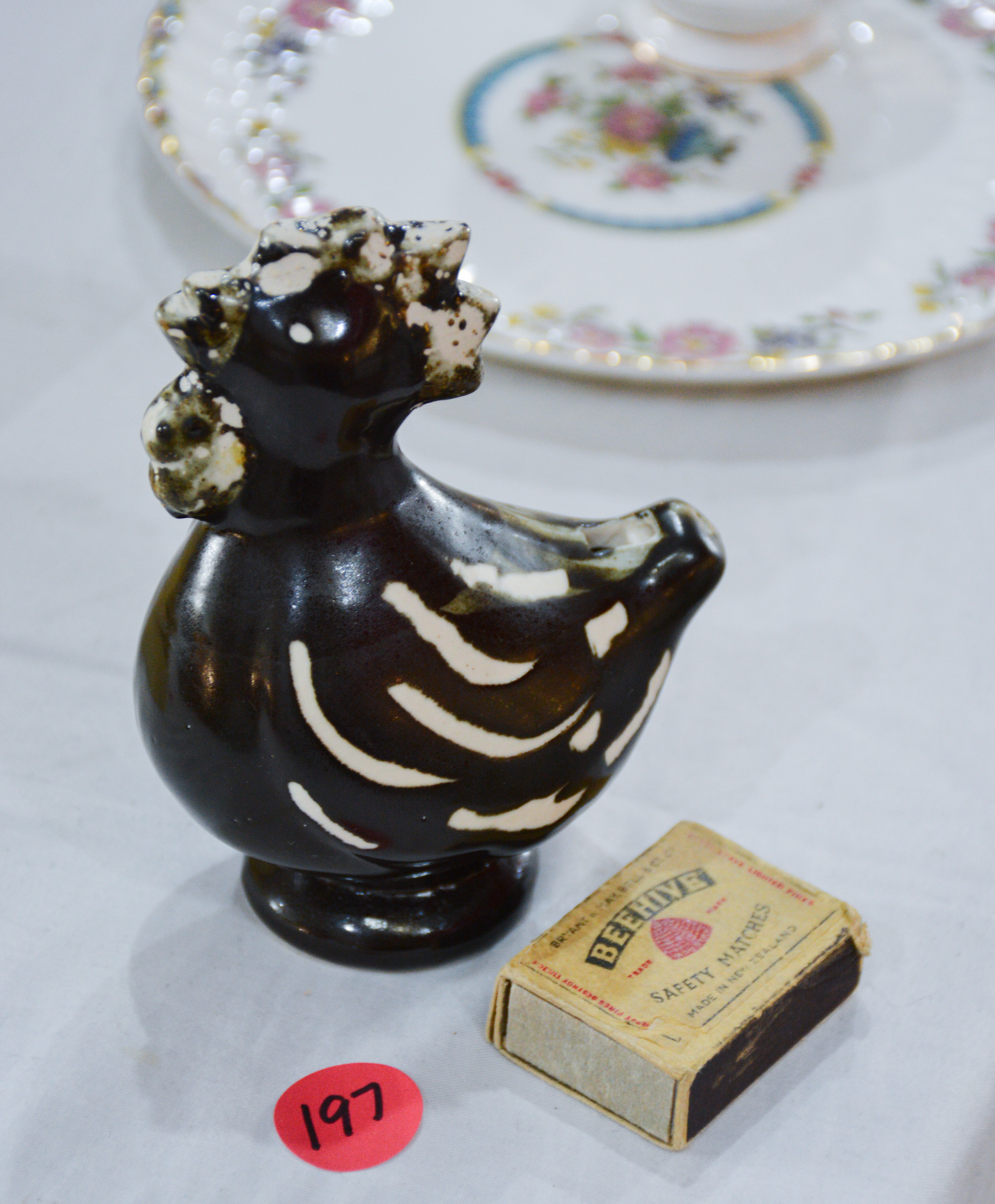 Ceramic Black/White Chicken — NZ auction result