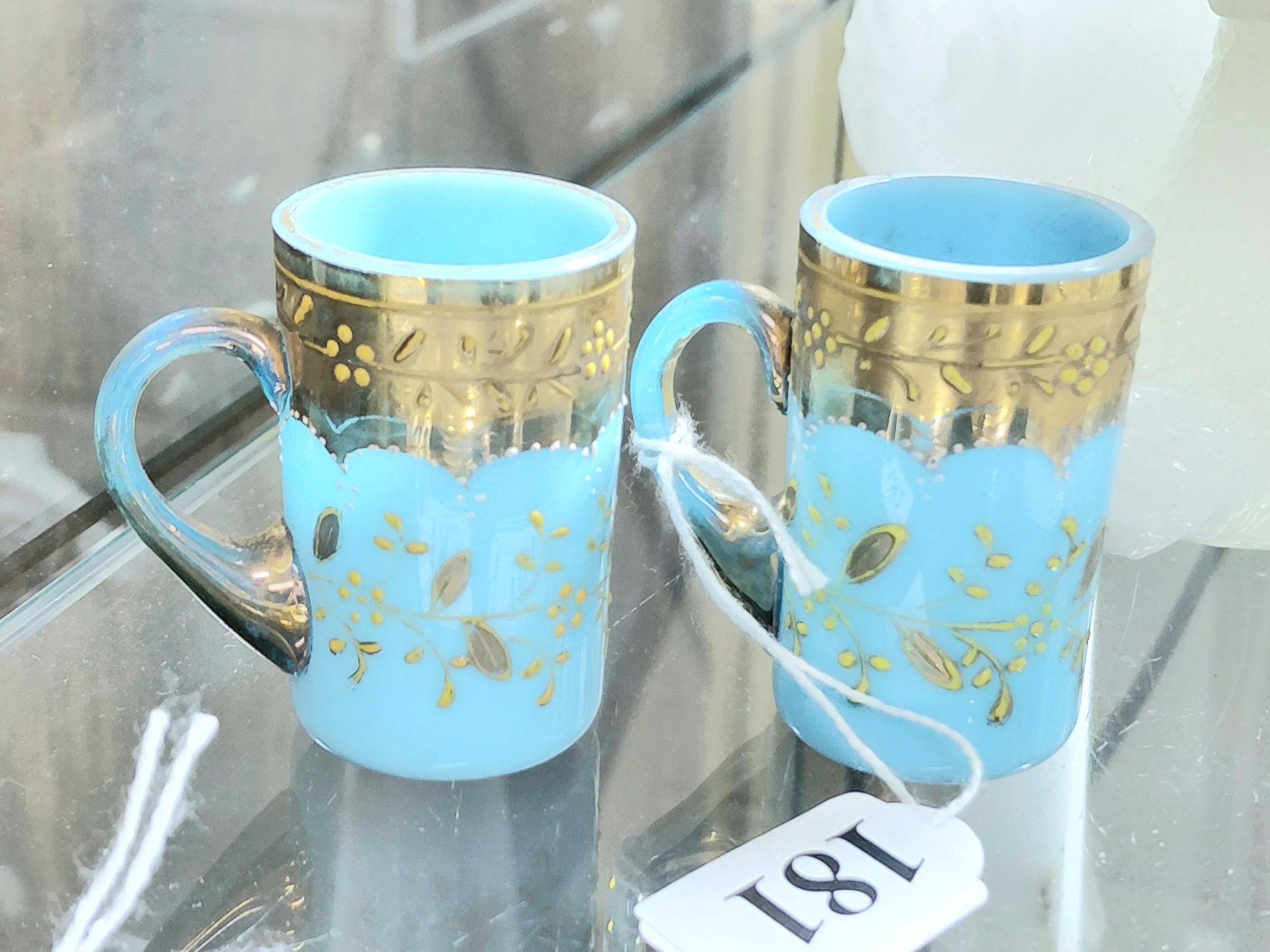 181 · A PAIR OF MOSER GLASS MINIATURE MUGS