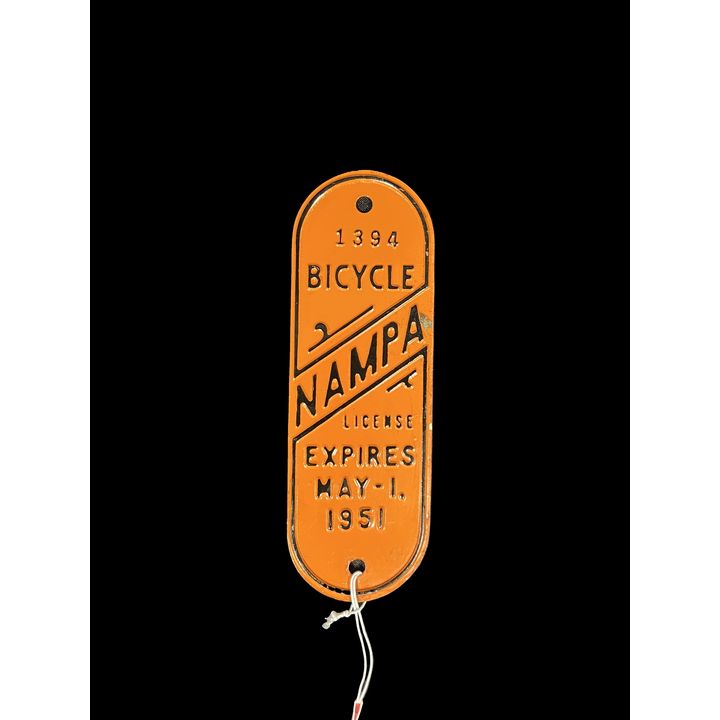 1394 Nampa Bicycle License Expires May 1 1951 Tin Metal Sign