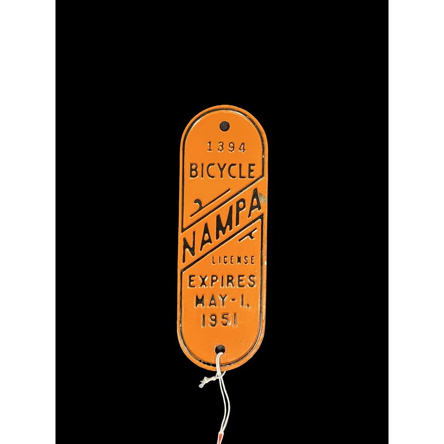 1394 Nampa Bicycle License Expires May 1 1951 Tin Metal Sign