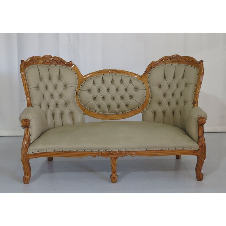 UPHOLSTERED SETTEE