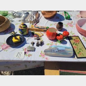 Assorted perfume bottles, decorative items, salt, pepper, Dominoes and other