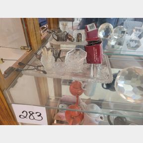 Glass tray with antique glass and silver serving pieces