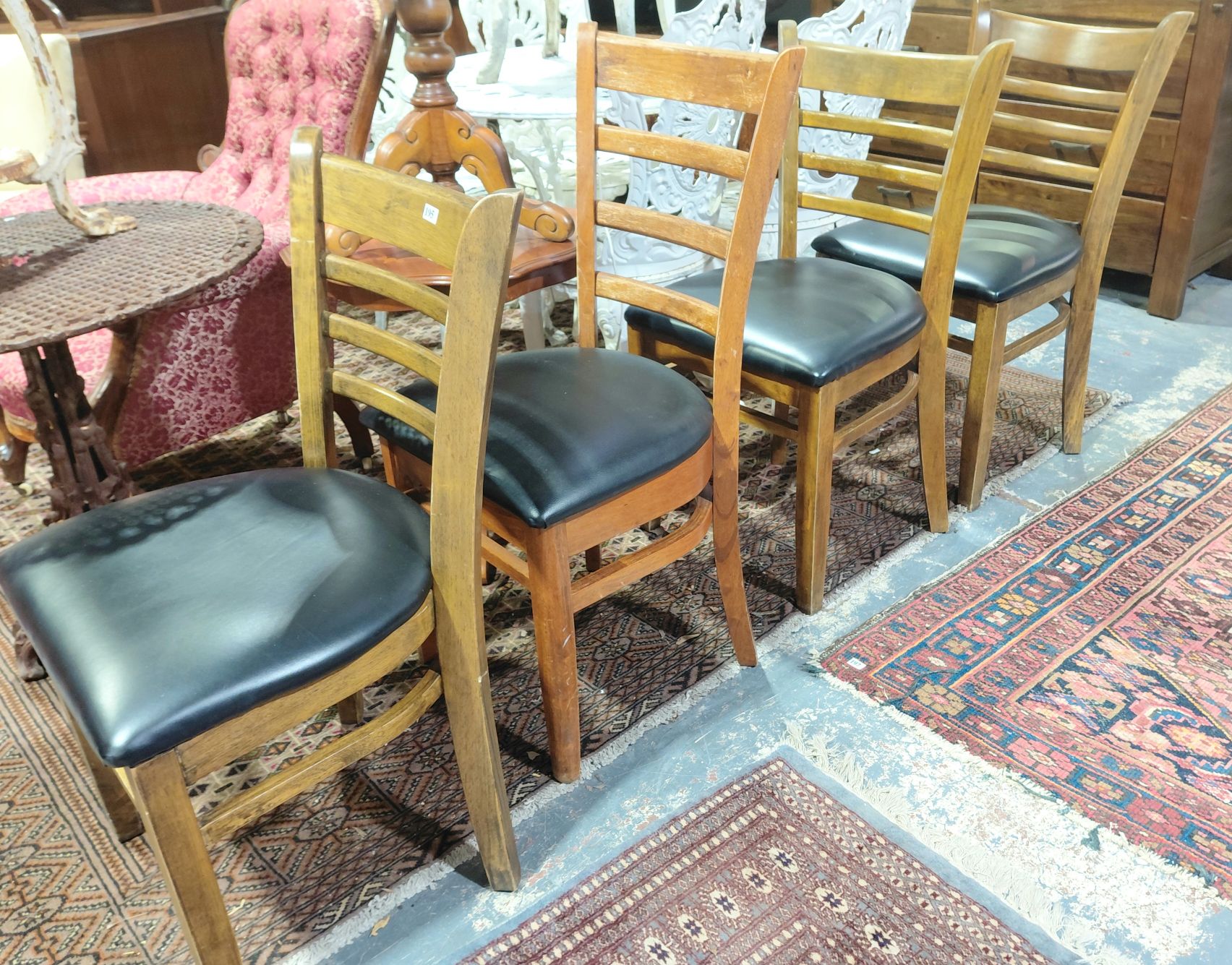 195 · 4 TIMBER MUSTANG STYLE DINING CHAIRS