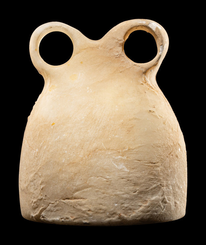 A Syrian Stone Spectacle Idol
Height 2 3/16 inches (6 cm).