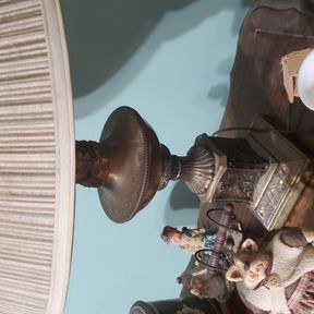 Table lamp and misc decorative things on end table