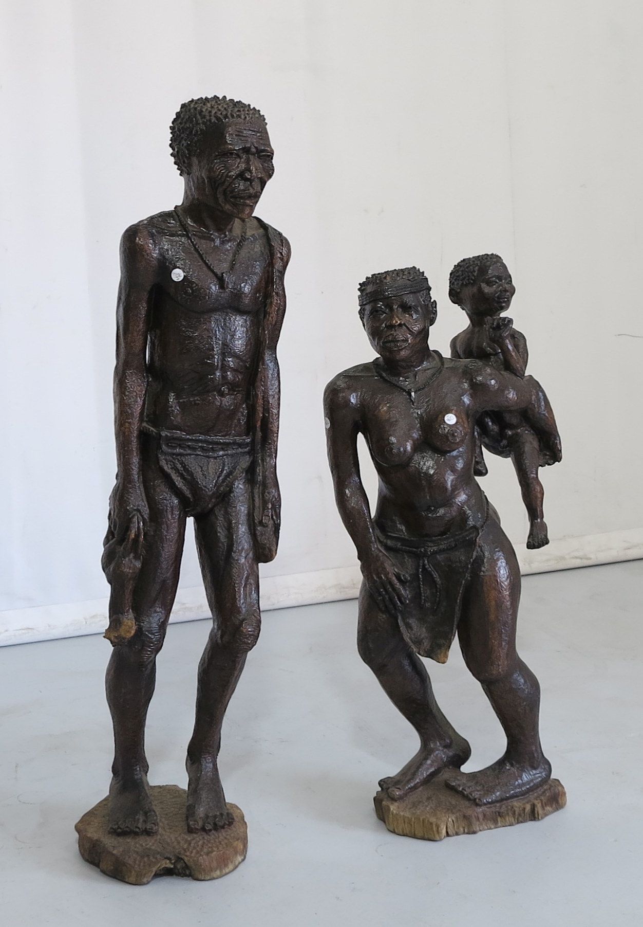 PAIR OF AFRICAN TRIBAL CARVED WOOD FIGURES | Westgate Walding Auctioneers