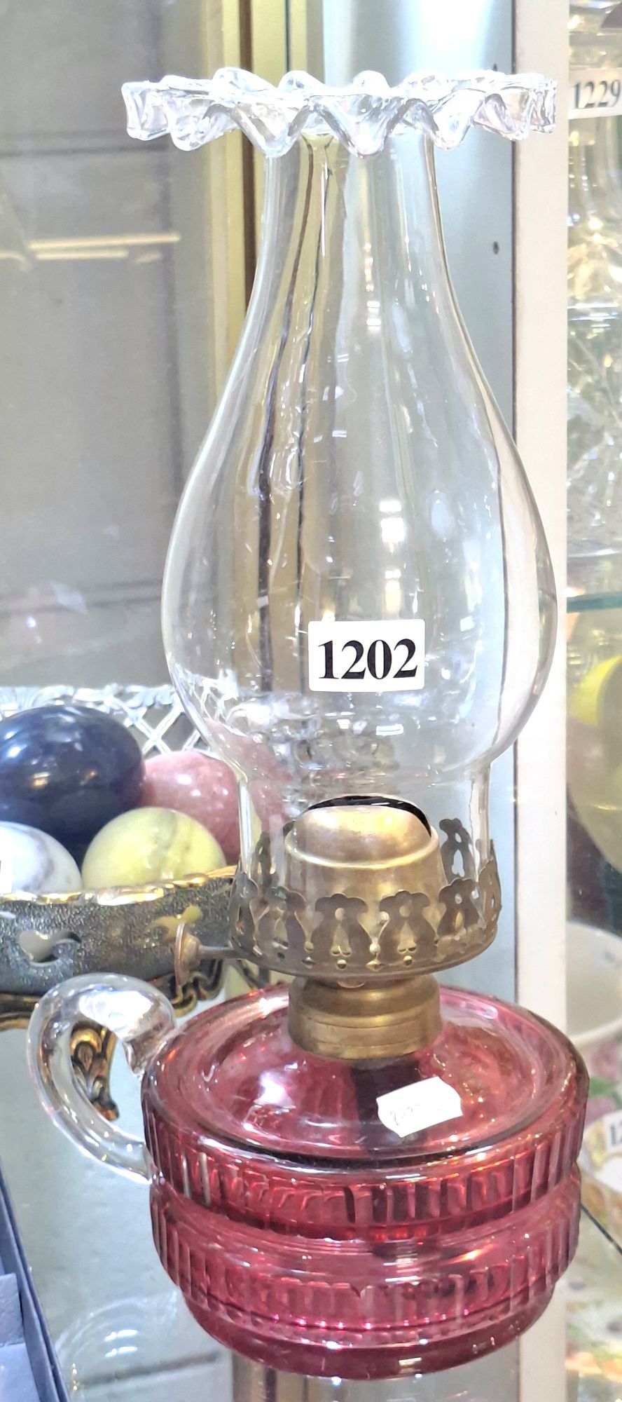 1202 · CRANBERRY GLASS FINGER OIL LAMP